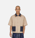 CLOT Redifined Utility By Edison Chen Mens Short Sleeve Shirt Warm Sandstone
